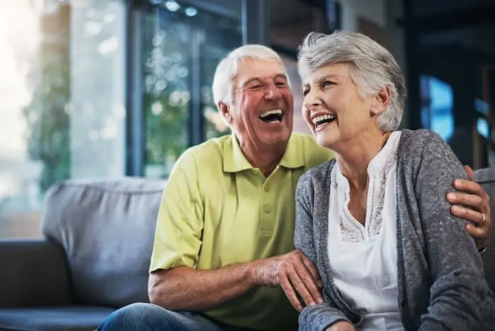 An older couple smiling together