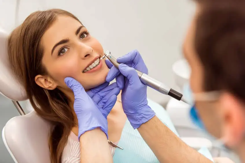 A close view of braces on upper teeth