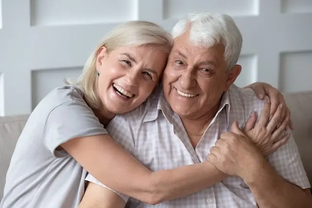 A woman smiling broadly